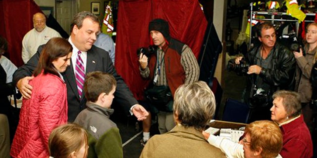 Tuesday: Chris Christie stands with wife Mary Pat Christie and children Bridgett and Patrick ahead of their voting in Mendham, N.J. (AP Photo)