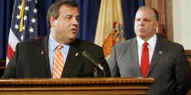 FILE: In this May, 2, 2011, photo, New Jersey Gov. Chris Christie and Senate President Stephen M. Sweeney discuss Supreme Court vacancies. They are now working together on health benefits contributions from state workers.