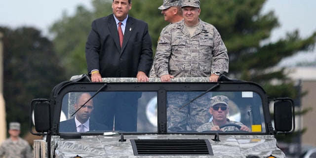 Sept. 28, 2014: New Jersey Gov. Chris Christie, left, and New Jersey Adjutant General Brig. Gen. Michael Cunniff, right, review troops during the New Jersey National Guard's annual Military Review in Sea Girt, N.J. (AP)