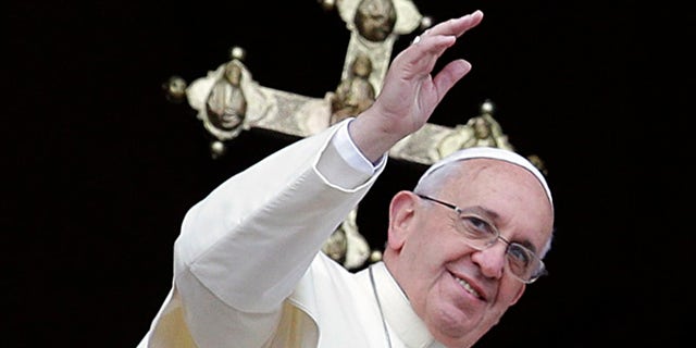 Dec. 25, 2013: Pope Francis delivers his "Urbi et Orbi" (to the City and to the World) message from the central balcony of St. Peter's Basilica at the Vatican.