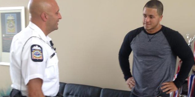 Officer James Poole and Christopher Jones. (Columbus Police Department)