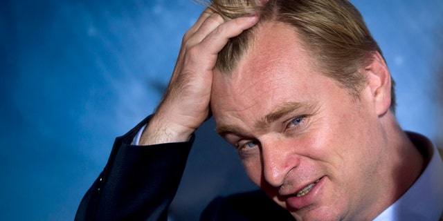 Director Christopher Nolan arrives for the premiere of the film "Interstellar" in New York November 3, 2014. REUTERS/Carlo Allegri (UNITED STATES - Tags: ENTERTAINMENT) - RTR4CP8D