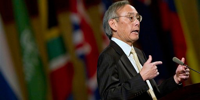 Secretary of Energy Steven Chu gestures as he delivering a keynotes address at a conference in Beijing, China, Sept. 22.