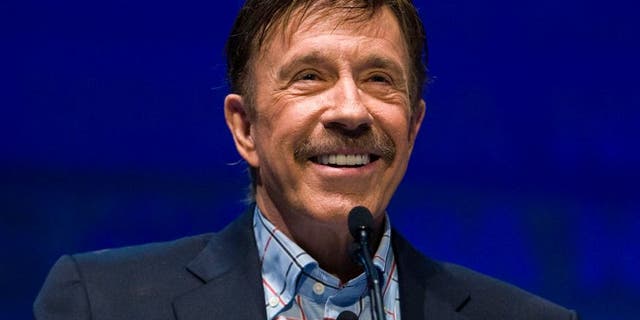 Actor Chuck Norris speaks during the National Rifle Association's 139th annual meeting in Charlotte, North Carolina May 14, 2010.
