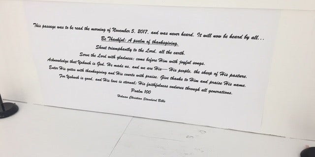 Psalm 100 is displayed inside the First Baptist Church.