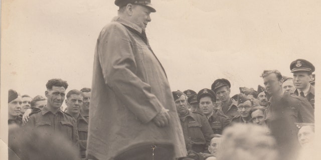 Churchill can be seen with RAF personnel at Airfield B3 near Gold Beach in Normandy (Henry Aldridge &amp; Son)