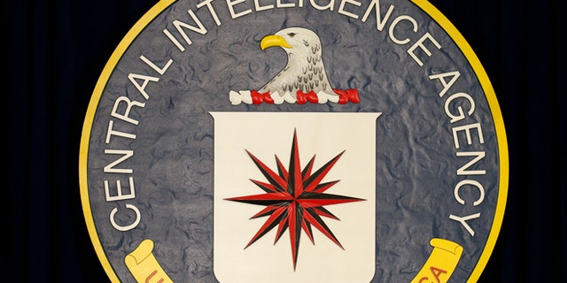 April 13, 2016: The CIA sign is seen onstage before the arrival of U.S. President Barack Obama to speak following a meeting with his National Security Council at CIA Headquarters in Langley, Virginia.