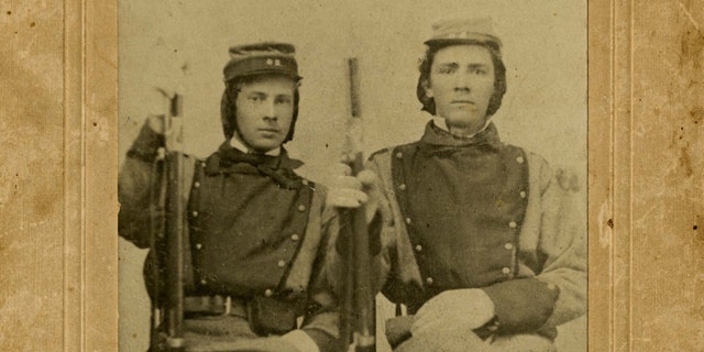 This photograph provided by the Library of Virginia William Henry Taylor, left, and Stephen Stewart, members of the 11th Virginia Infantry.
