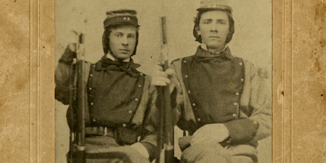 This photograph provided by the Library of Virginia William Henry Taylor, left, and Stephen Stewart, members of the 11th Virginia Infantry.