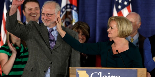 In this Nov. 6, 2012 file photo, Sen. Claire McCaskill, D-Mo., touches the face of her husband, Joseph Shepard, while declaring victory in the Missouri Senate race in St. Louis.