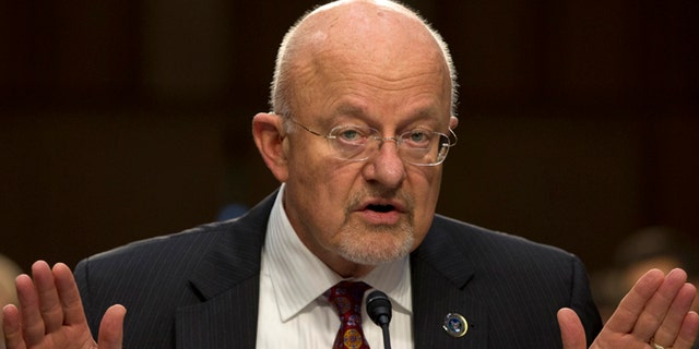 FILE: Sept. 26, 2013: Director of National Intelligence James Clapper testifies on Capitol Hill in Washington.
