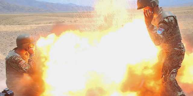 Photo taken by an Afghan Army photographer of the moment when a mortar tube accidentally exploded during an Afghan National Army (ANA) live-fire training exercise in Laghman Province, Afghanistan.
