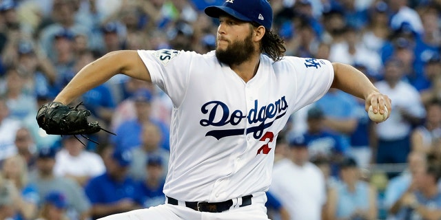 Clayton Kershaw delivered the first pitch of the 113th World Series