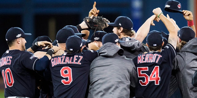 Oct. 19, 2016: The Cleveland Indians celebrate after defeating the Toronto Blue Jays 3-0 in Game 5 of the American League Championship Series in Toronto