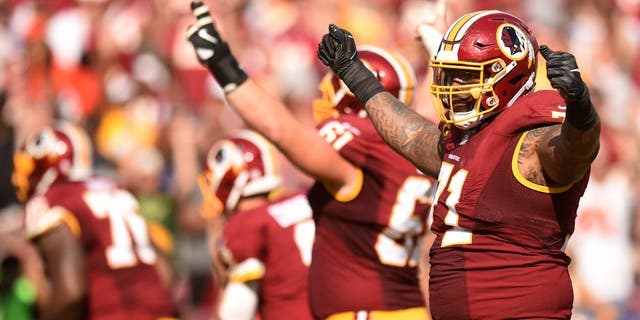 LANDOVER, MD - OCTOBER 2: Tackle Trent Williams #71 of the Washington Redskins acknowledges the crowd in the fourth inning against the Cleveland Browns at FedExField on October 2, 2016 in Landover, Maryland. (Photo by Mitchell Layton/Getty Images)