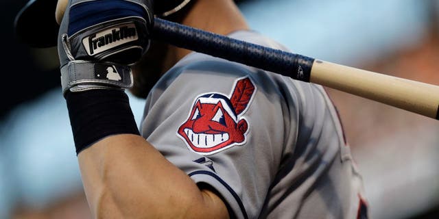 The Cleveland Indians logo is seen on a jersey sleeve during a baseball game against the Baltimore Orioles in Baltimore, June 26, 2015.
