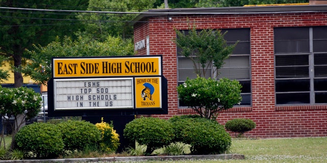 May 13, 2015: This photo shows the landscaped front of East Side High School in Cleveland, Miss.. The school could possibly undergo a name and mission change after a federal judge ruled Friday that the school district must merge its high schools and middle schools to achieve racial desegregation.