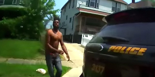 Police arrived at the scene only to be confronted by the shirtless man who lunged at them; he was shot but jumped right back up