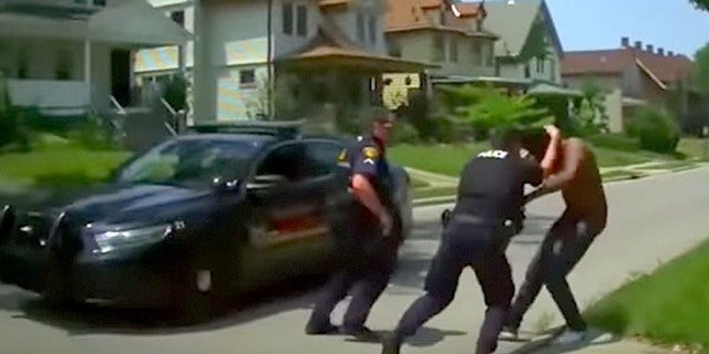 The officers were able to tackle the man to the ground and arrest him but not before one suffered an orbital eye fracture and the other a broken hand