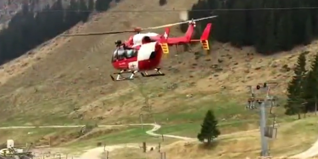 A rescue helicopter at the mountain in Lucerne.