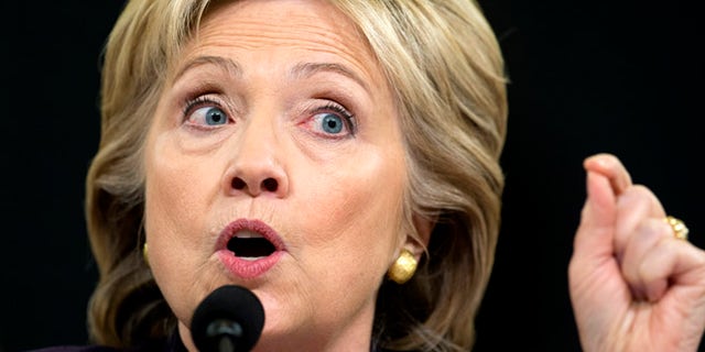 Former Secretary of State Clinton testifies in Washington before the House Benghazi Committee. 