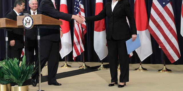 Tuesday: Secretary of State Hillary Rodham Clinton shakes hands with Japanese Foreign Minister Takeaki Matsumoto at a news conference at the State Department.