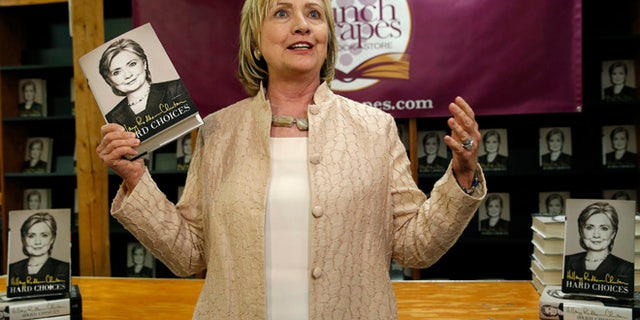 Aug 13, 2014: Hillary Clinton arrives for a signing session for her book "Hard Choices" at the Bunch of Grapes bookstore in Vineyard Haven on Martha's Vineyard, Massachusetts. (Reuters)
