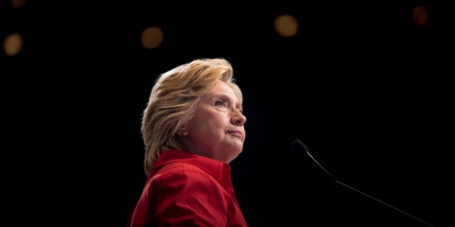 FILE - In this Saturday, July 30, 2016 file photo, Democratic presidential candidate Hillary Clinton pauses while speaking at a rally in Pittsburgh during a bus tour through the rust belt. In 2016, after repeated attempts to break into various staffers hillaryclinton.com email accounts, the hacking group known as Fancy Bear took a new tack, targeting top Clinton lieutenants at their personal Gmail addresses. (AP Photo/Andrew Harnik)