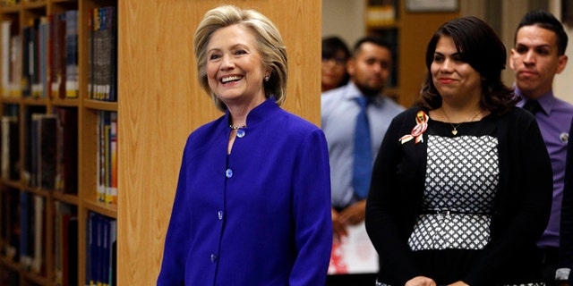 May 5, 2015: Democratic presidential candidate Hillary Rodham Clinton walks into an event at Rancho High School in Las Vegas. (AP)