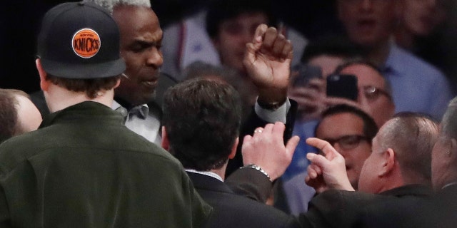 Feb. 8, 2017: Former New York Knicks player Charles Oakley exchanges words with a security guard during the first half of an NBA basketball game between the New York Knicks and the Los Angeles Clippers at Madison Square Garden in New York