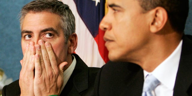 George Clooney with then Senator Barack Obama in 2006.