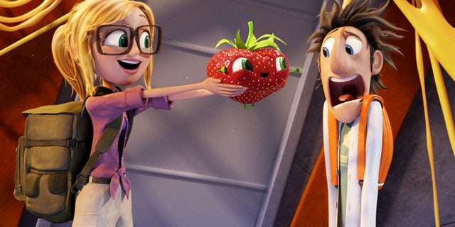 This film image released by Sony Pictures Animation shows characters, from left, Sam Sparks, voiced by Anna Faris, Barry the Strawberry, voiced by Cody Cameron, and Flint Lockwood, voiced by Bill Hader in a scene from "Cloudy with a Chance of Meatballs."