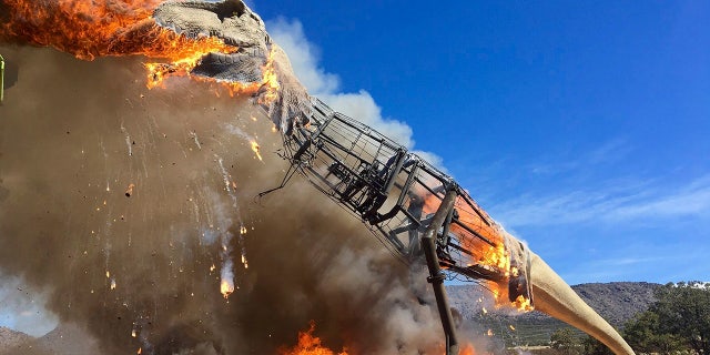A life-sized animatronic Tyrannosaurus Rex at the Royal Gorge Dinosaur Experience in Canon City, Colo., is ablaze after an electrical issue, according to Royal Gorge Dinosaur Experience personnel.