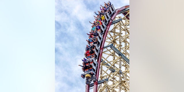 The 74-mile-an-hour “hyper-hybrid” coaster, made from a steel track on a wooden frame, towers 205 feet above the park and boasts 10 world records.