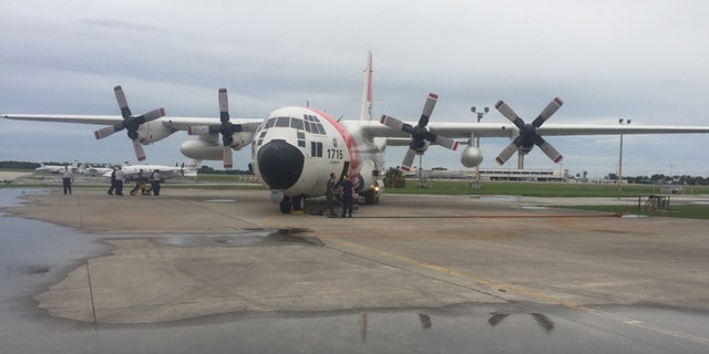 An Air Station Clearwater HC-130 Hercules airplane medevacs four American citizens from Exuma, Bahamas, to Clearwater, Florida, June 30, 2018.
