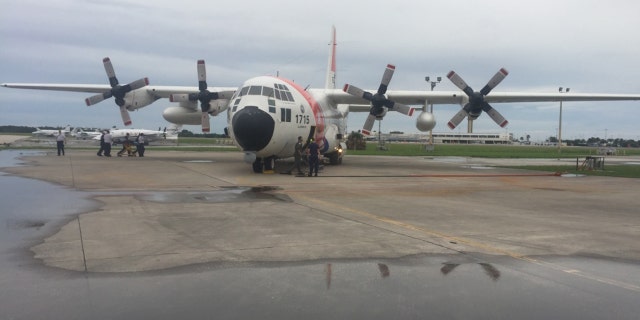 An Air Station Clearwater HC-130 Hercules airplane medevacs four American citizens from Exuma, Bahamas, to Clearwater, Florida, June 30, 2018.