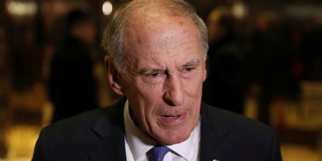 Former Sen. Dan Coats (R-IN) stops to speak to the news media after a meeting at Trump Tower with U.S. President-elect Donald Trump in New York, U.S., November 30, 2016.