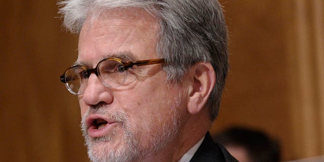 Dec. 17, 2013: Sen. Tom Coburn, R-Okla., speaks on Capitol Hill in Washington.
