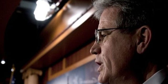 Sen. Tom Coburn is seen at a news conference on Capitol Hill Dec. 19. (AP Photo)