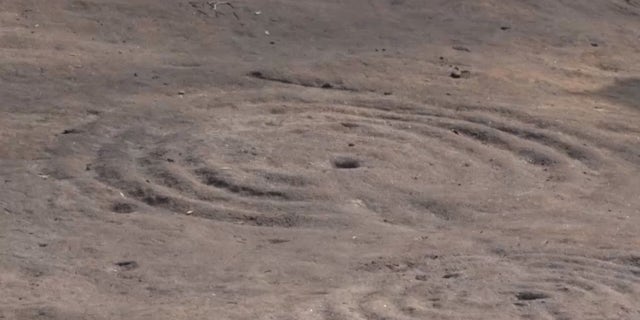 The Cochno Stone, which dates back to around 3000 B.C., contains a type of artwork called "cup and ring marks."
