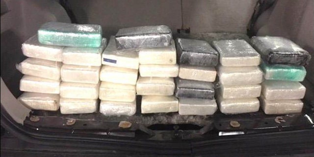 A drug-sniffing K-9 unit was brought in and alerted to the Mercury’s cargo area, where police found the bricks of cocaine worth over $1 million.