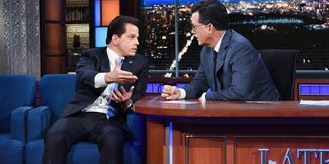 In this photo provided by CBS, Anthony Scaramucci, left, appears on CBS' "Late Show" with Stephen Colbert, Monday, Aug. 14, 2017, in New York. (Scott Kowalchyk/CBS via AP)