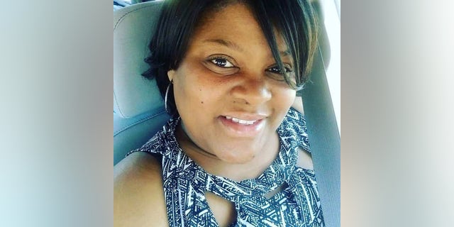 This undated selfie provided by Heather Coggins shows her, a niece of Timothy Coggins.