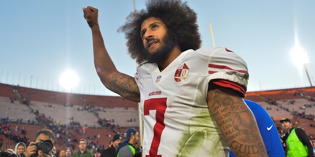 Former San Francisco 49ers quarterback Colin Kaepernick (7) pumps his fist as he acknowledges the cheers from the 49ers' fans after leading his team to a 22-21 come-from-behind win over the Los Angeles Rams in December 2016.
