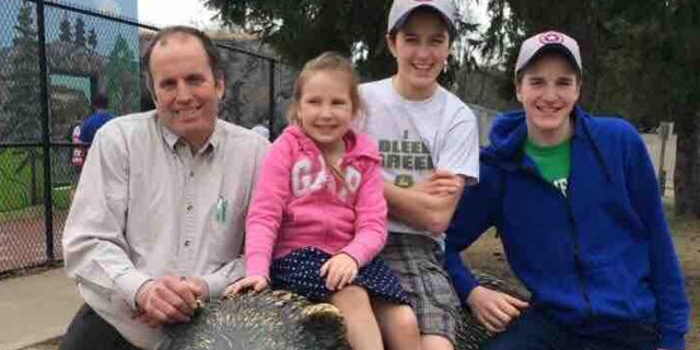 Daniel Briel, left, and his 14-year-old son, David Briel, center, were both killed in a collapse in a silo at their Wisconsin farm.