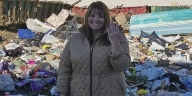Colleen Dyckman, of Long Island, with the rings she accidentally tossed in the trash. (CBS New York)