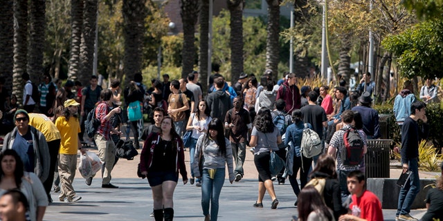 This April 4, 2012 file photo shows students on campus at Santa Monica College in Santa Monica, California.