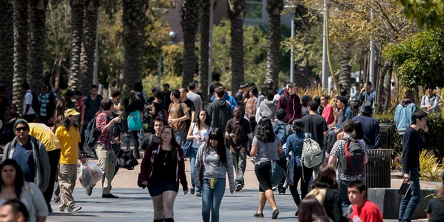 This April 4, 2012 file photo shows students on campus at Santa Monica College in Santa Monica, California.