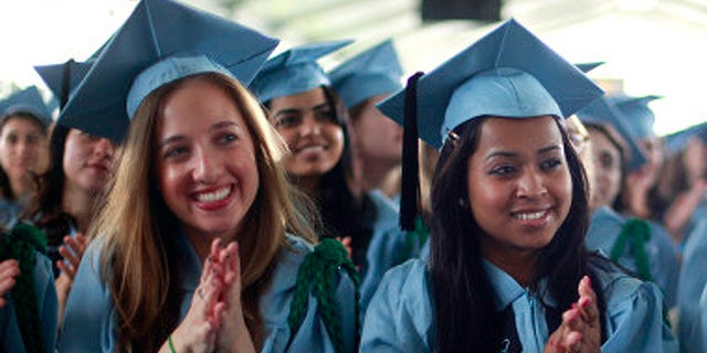 A gender gap is widening among members of Generation X when it comes to getting a college degree. (AP file)