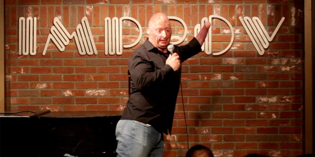 Wounded veteran Bobby Henline performs stand-up comedy.